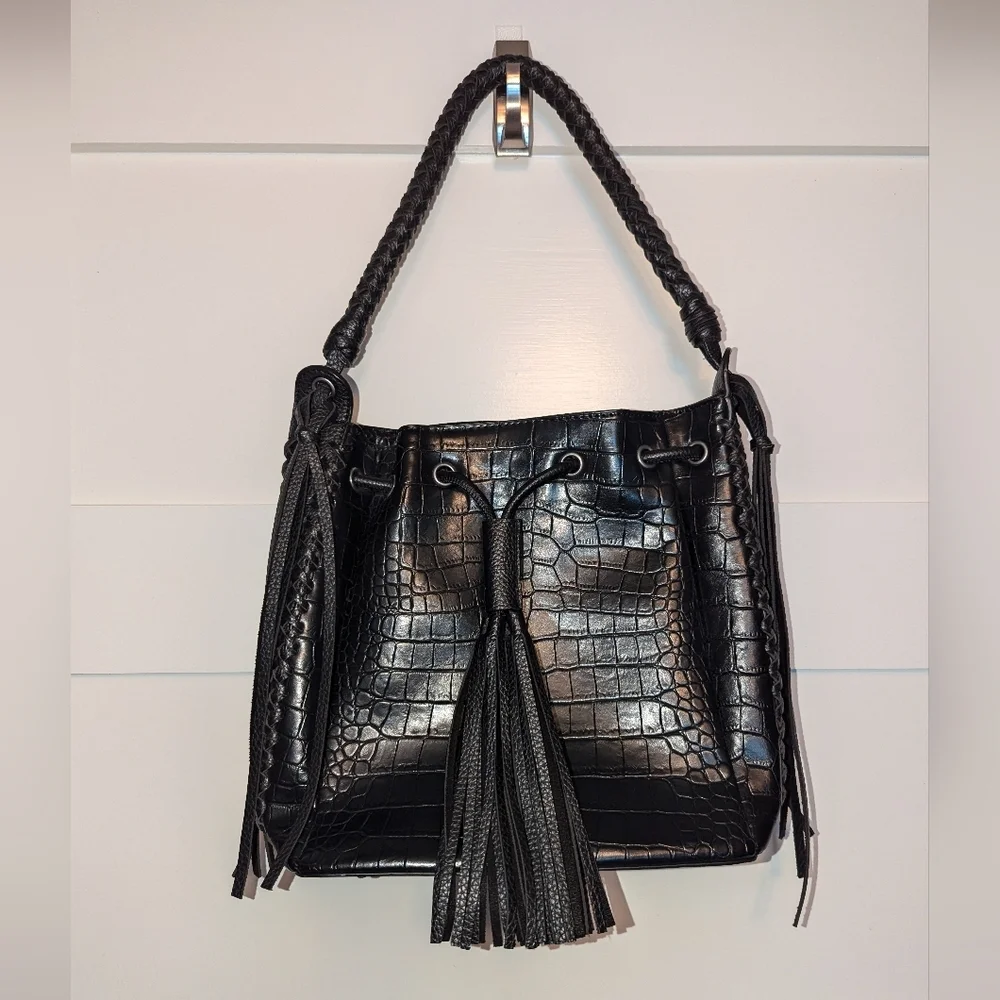 Like New Black Leather Wrangler braided shoulder bag. Black purse. Fring…